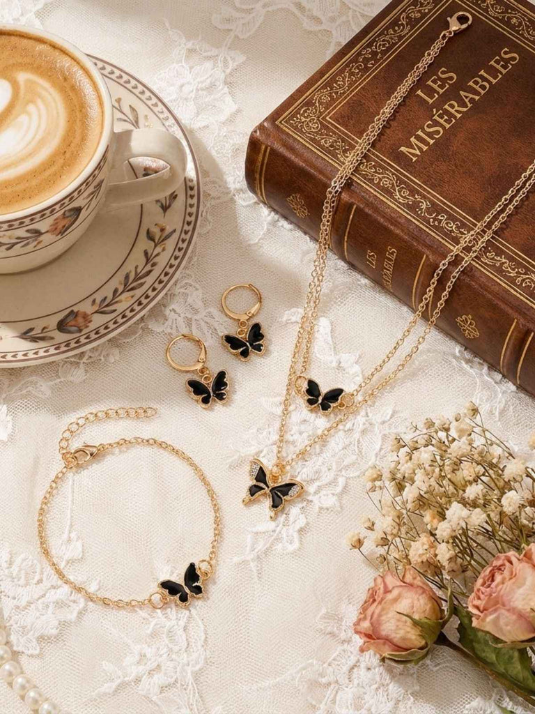 Set Collana e Bracciale e Orecchini con Farfalle e Strass