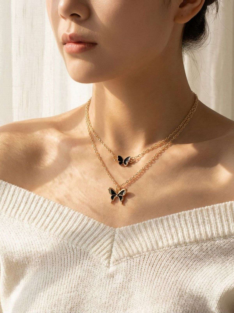 Set Collana e Bracciale e Orecchini con Farfalle e Strass