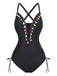 A black one-piece swimsuit featuring a deep V-neckline decorated with colorful hanging tassels and side-tie details.