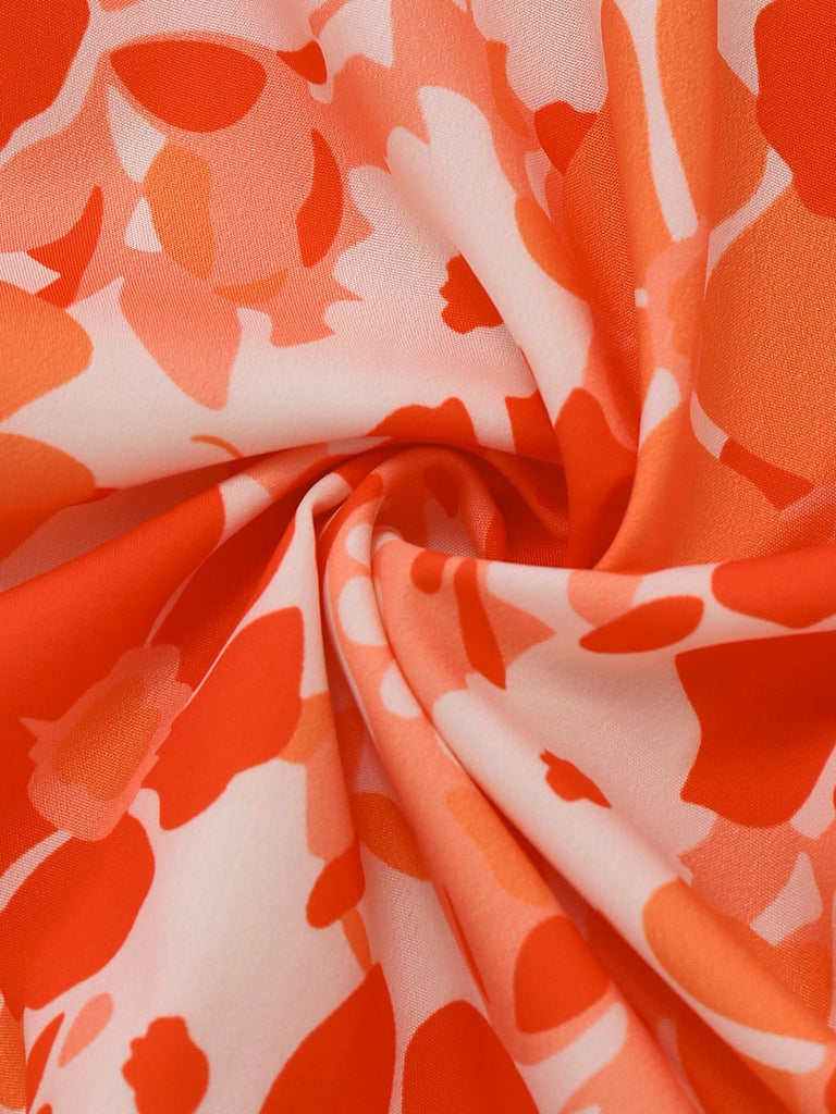 Close-up of orange and white floral patterned fabric