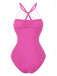 Pink swimsuit with white lace details on a white background