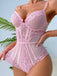 A model wearing the pink lace and mesh bodysuit, showcasing the fit and semi-sheer floral detailing.