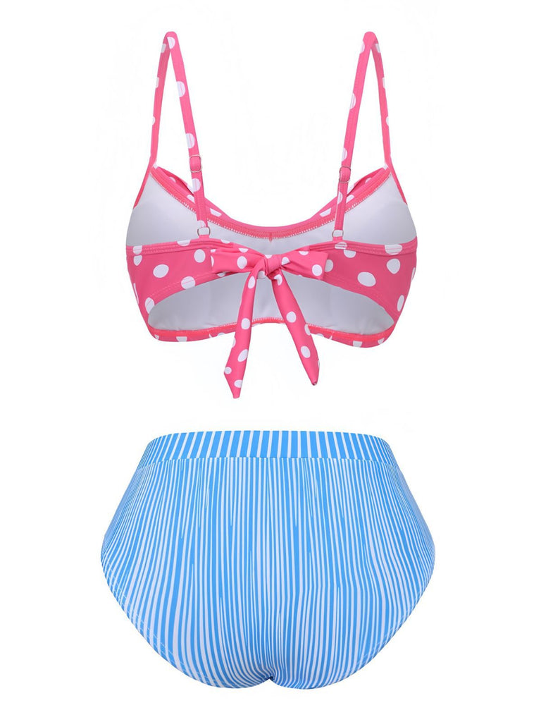 Back view of the bikini set highlighting the tie-back closure of the pink polka dot top and the full coverage of the striped bottoms.