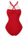 Red swimsuit with white lace details on a white background