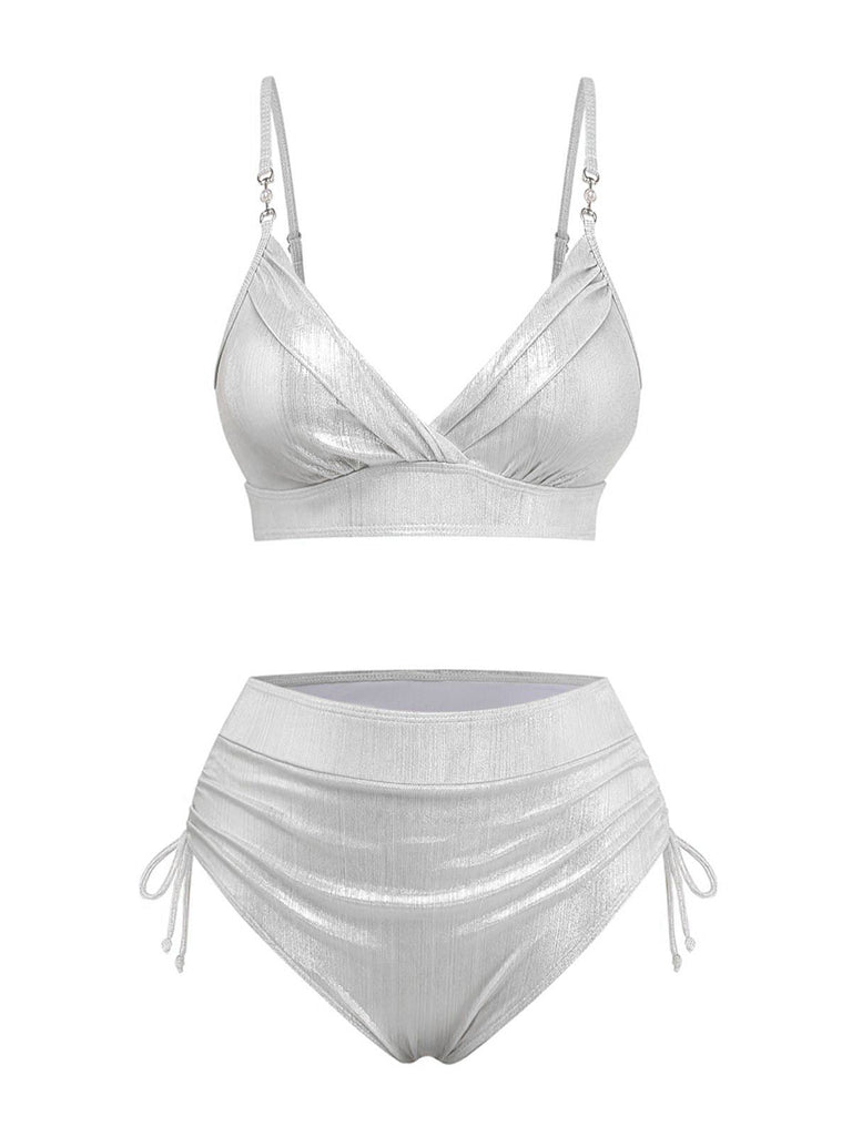 The high-waisted metallic bikini set in a shimmering silver color variant, front view.