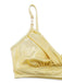 Detailed shot of the triangle bikini top featuring beaded accents on the straps and metallic fabric texture.