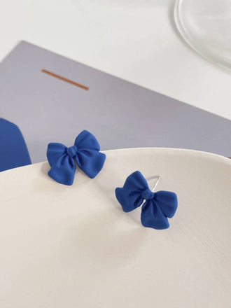 Fiocco blu retrò - Orecchini a bottone con nodo