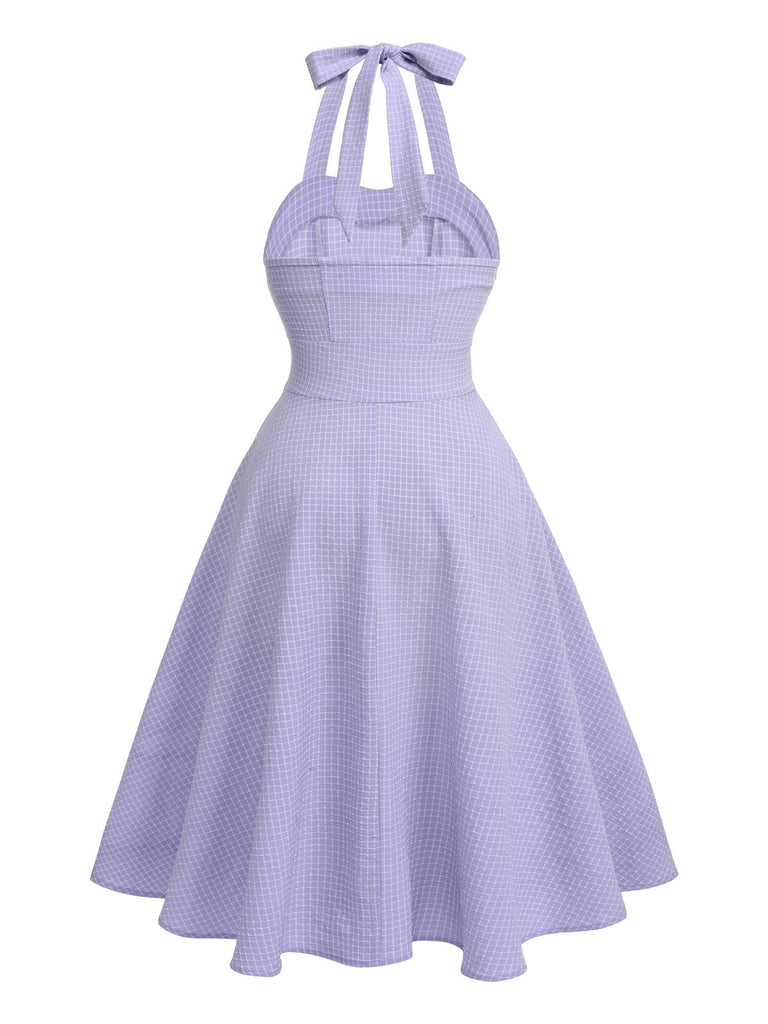 Abito vintage con scollo all'americana viola degli anni '50