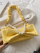 Borsa con perle e fiocco
