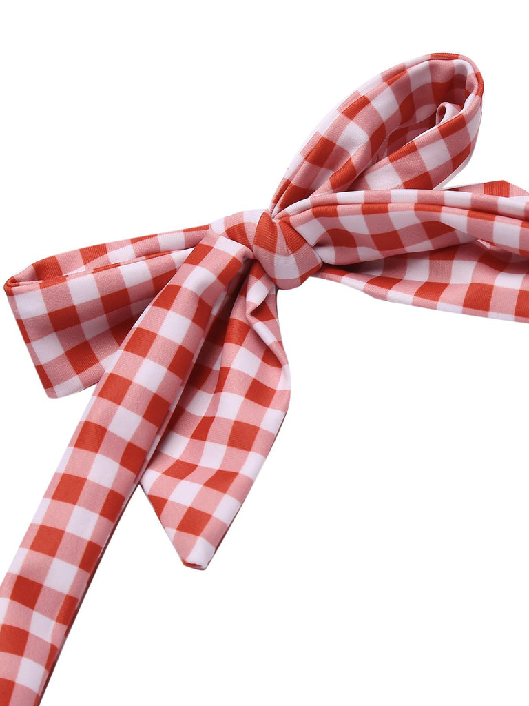 Costumi intero a quadri con fiocco rosso anni '50